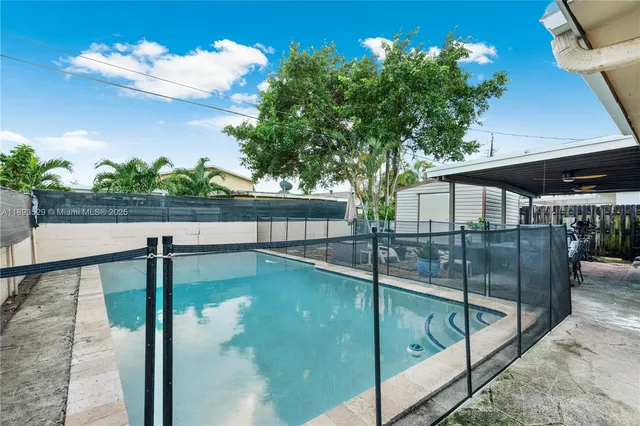 a outdoor dining space with furniture and outdoor view