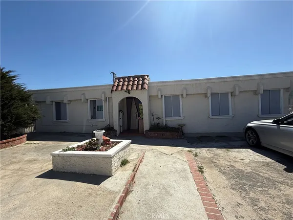 a front view of a house with patio