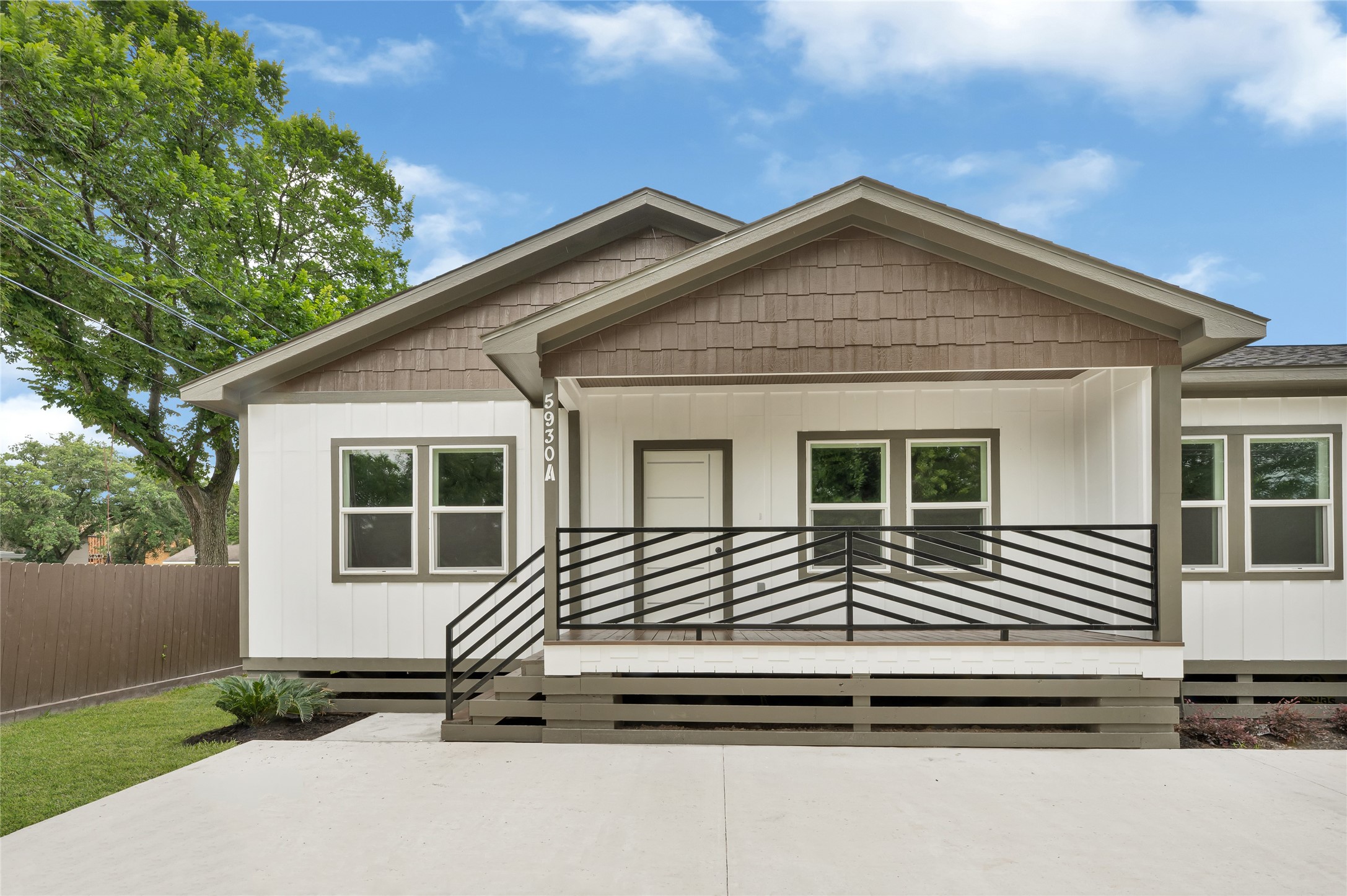 5930 Boness Road, Unit A & B Houston, TX 77396 - Photo 4 of 43 Front porch featuring custom-crafted metal handrails.