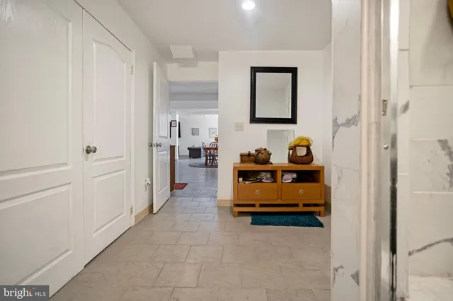 a bedroom with bed and window