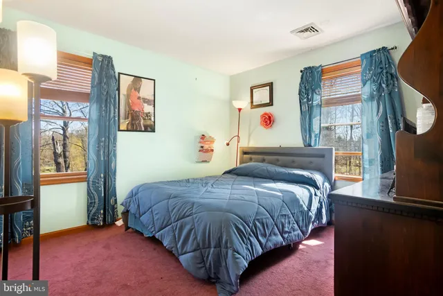 a bath tub sitting next to a bathroom