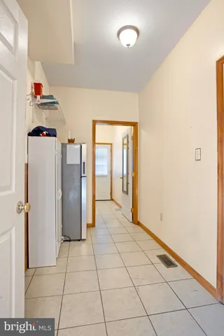 a view of a workspace with furniture