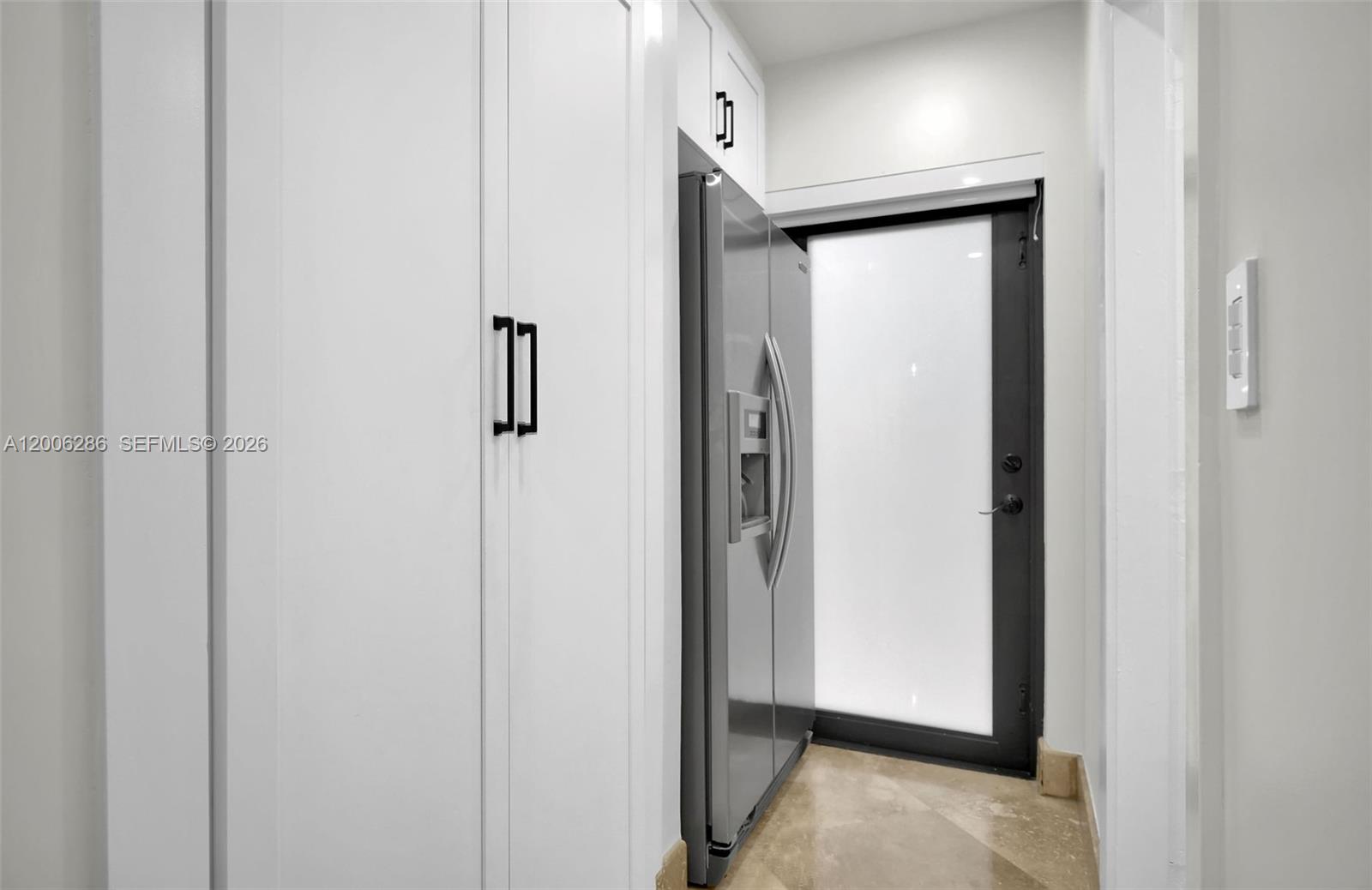 6820 Southwest 86th Avenue Miami, FL 33143 - Photo 13 of 37 a view of a hallway with closet