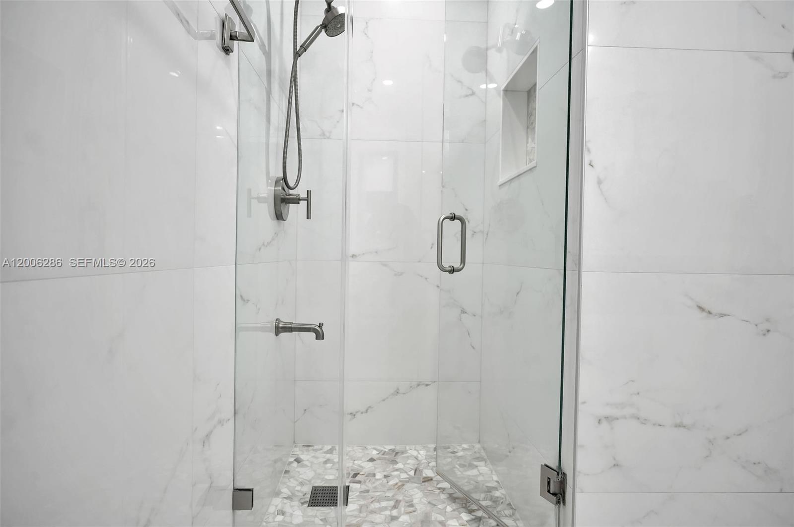 6820 Southwest 86th Avenue Miami, FL 33143 - Photo 16 of 37 a bathroom with a shower