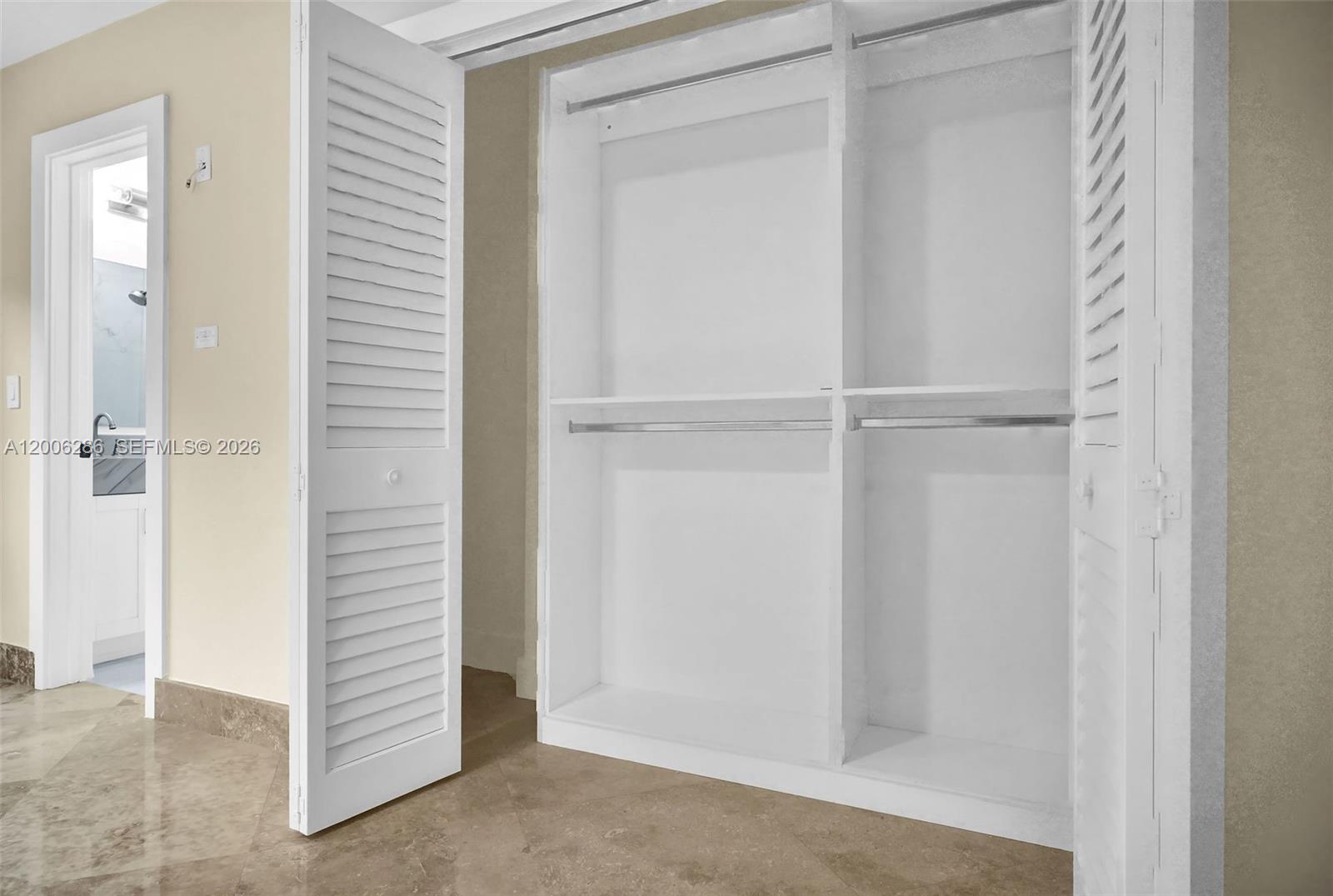 6820 Southwest 86th Avenue Miami, FL 33143 - Photo 17 of 37 a view of a walk in closet