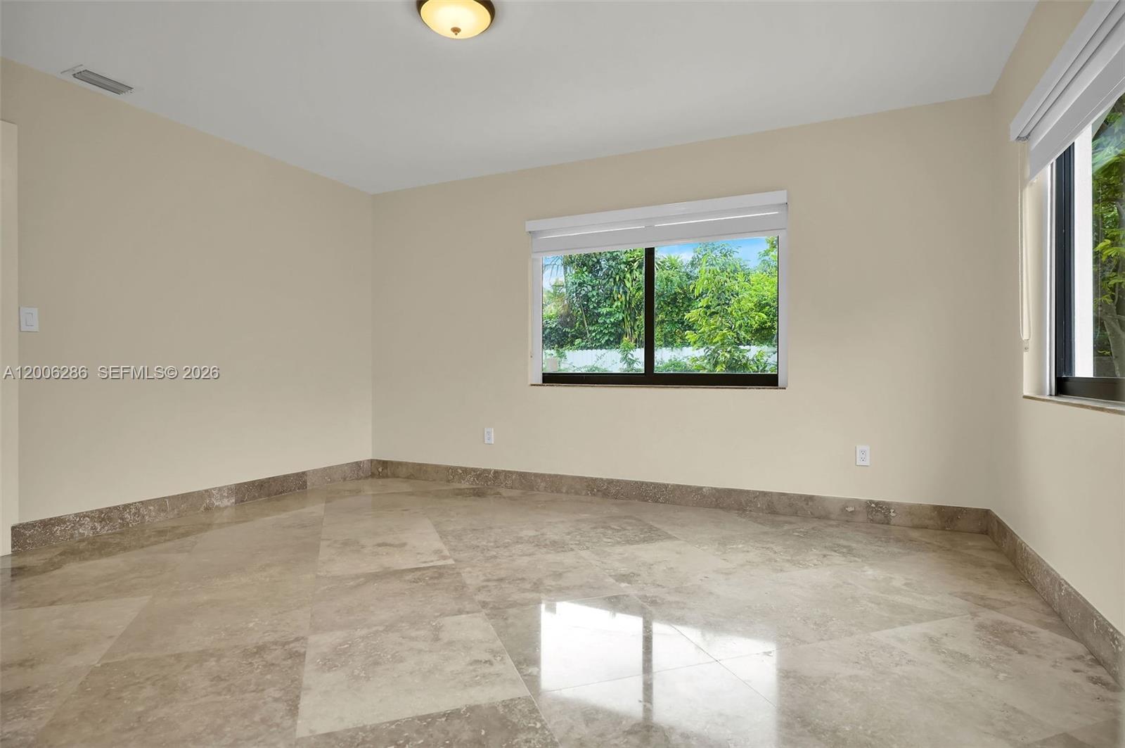 6820 Southwest 86th Avenue Miami, FL 33143 - Photo 20 of 37 an empty room with windows