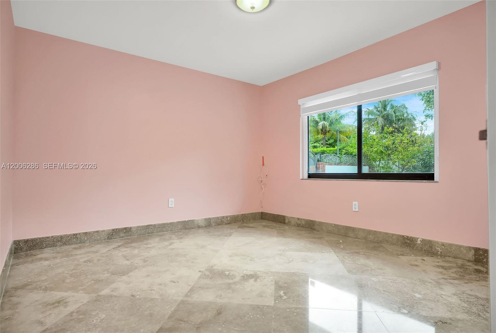 6820 Southwest 86th Avenue Miami, FL 33143 - Photo 21 of 37 an empty room with a window