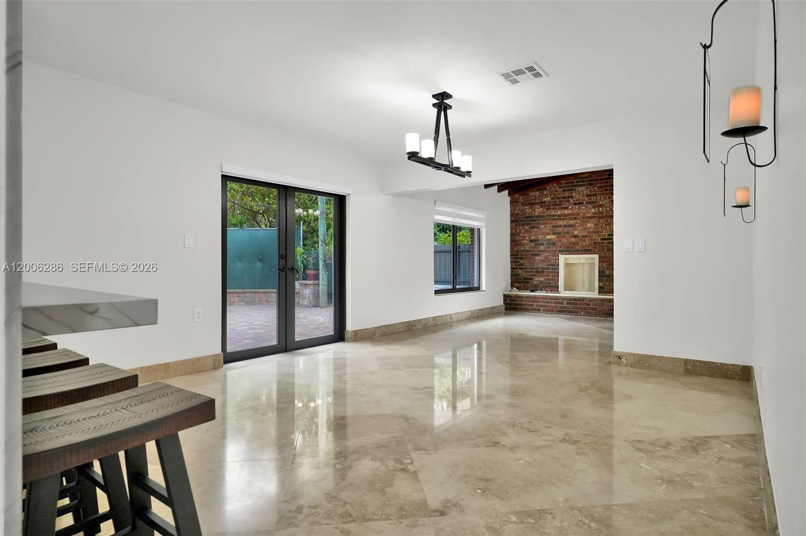 6820 Southwest 86th Avenue Miami, FL 33143 - Photo 23 of 37 a view of a livingroom with a furniture window and wooden floor