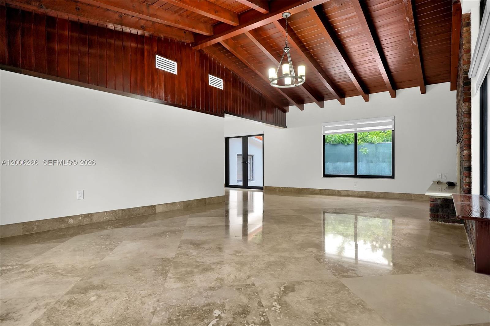 6820 Southwest 86th Avenue Miami, FL 33143 - Photo 3 of 37 a view of an entryway with a window