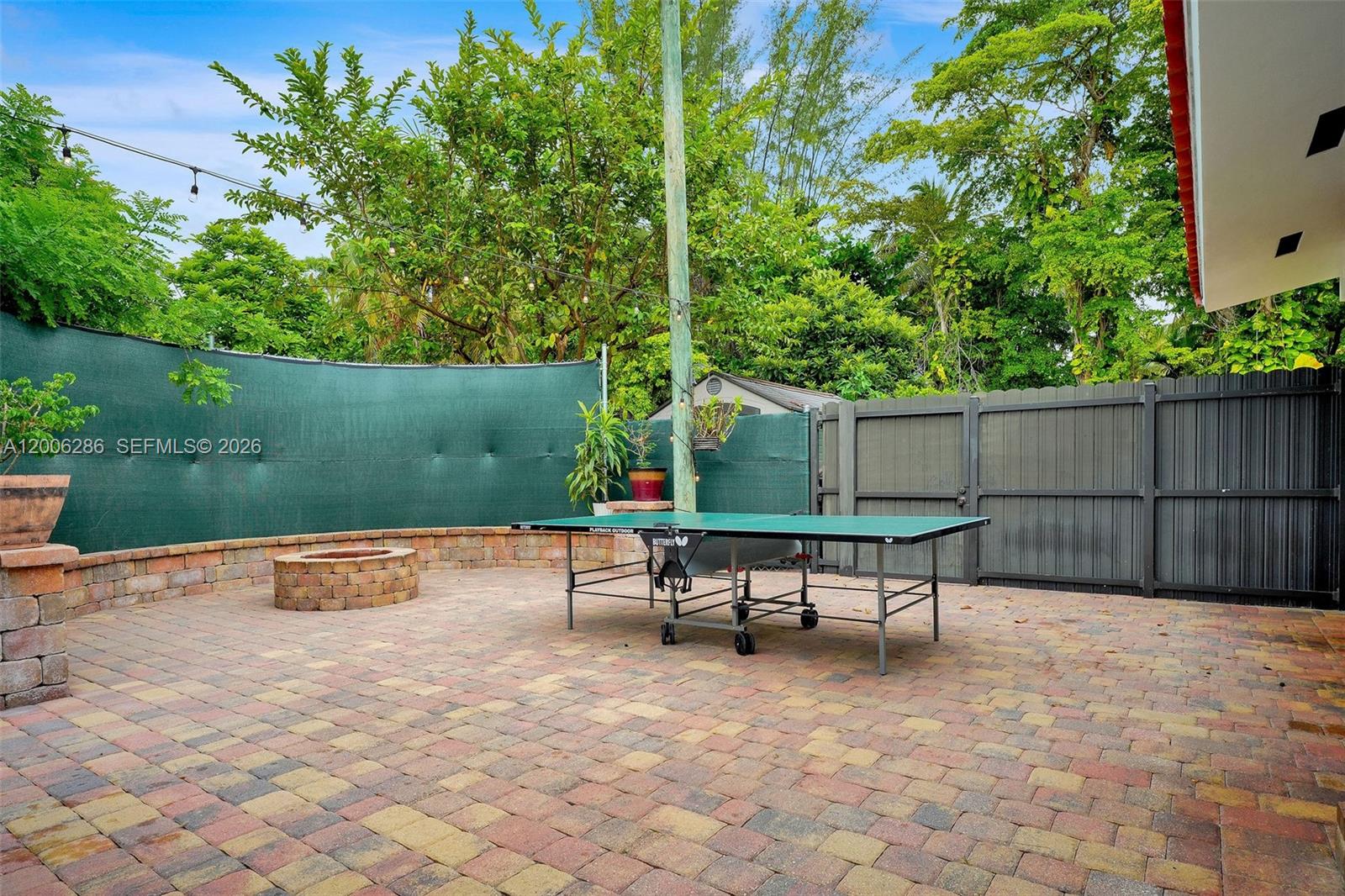 6820 Southwest 86th Avenue Miami, FL 33143 - Photo 35 of 37 a park view with a bench and some trees