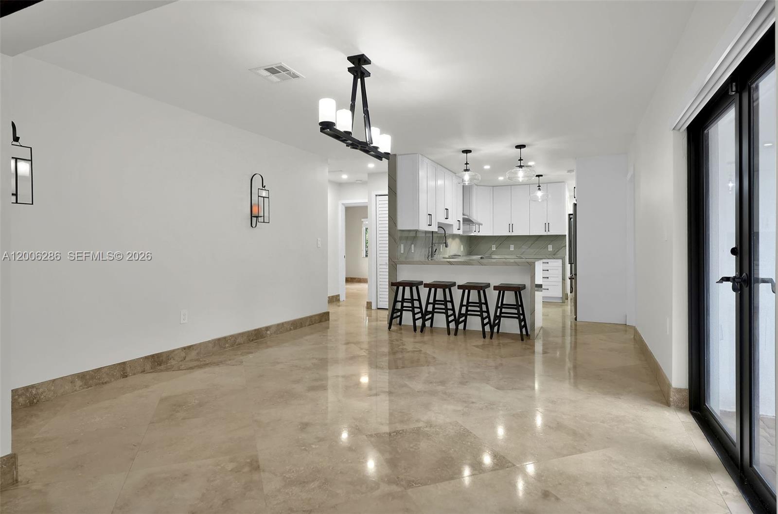 6820 Southwest 86th Avenue Miami, FL 33143 - Photo 7 of 37 a view of a dining room with furniture
