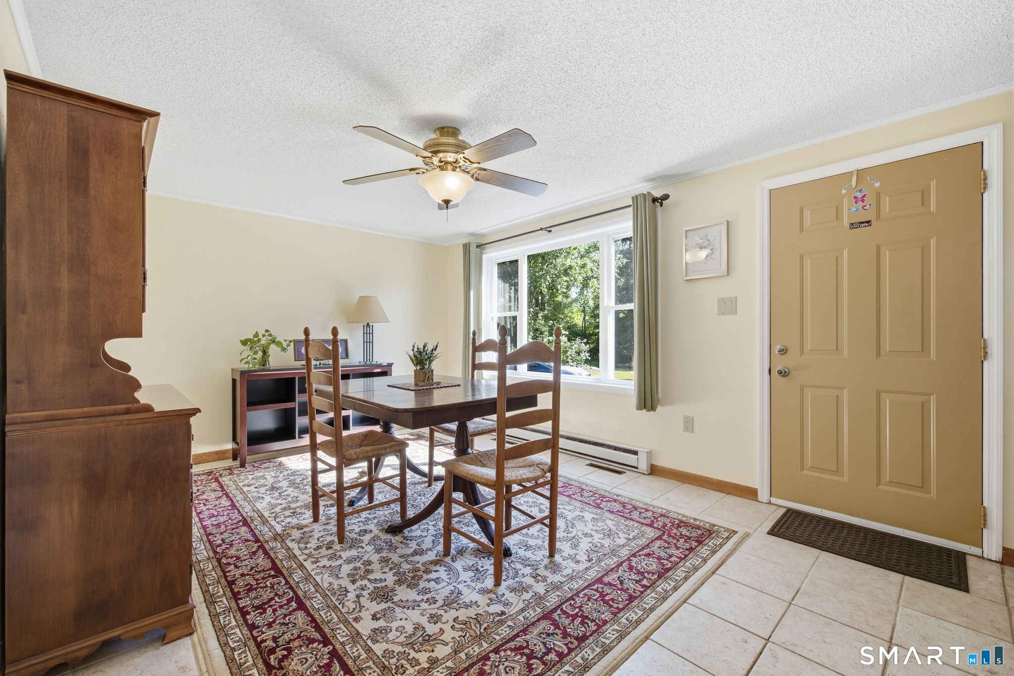141 Hop River Road Coventry, CT 06238 - Photo 10 of 40 a view of a dining room with furniture