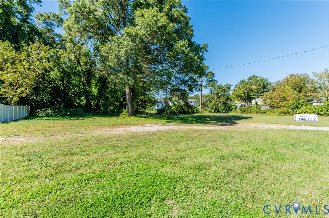 a view of a garden and basketball court