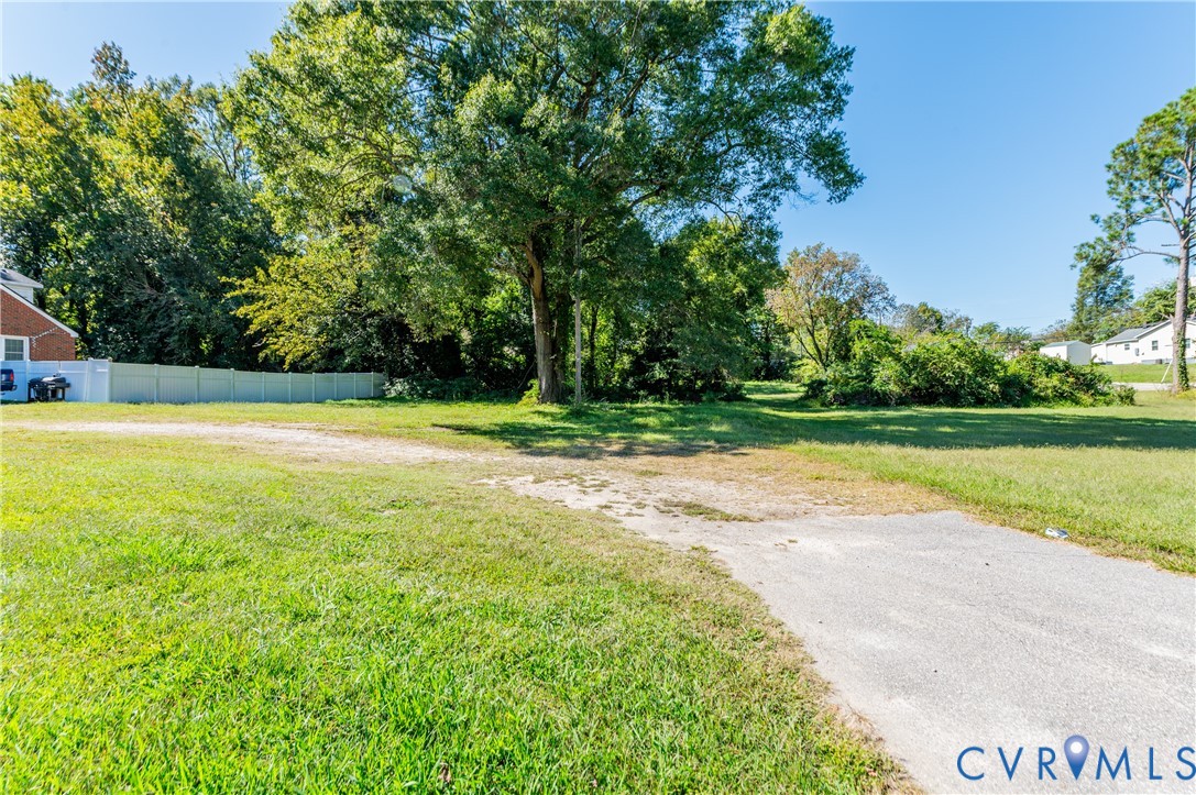 1304 Arlington Road Hopewell, VA 23860 - Photo 3 of 16 a view of a swimming pool and a yard