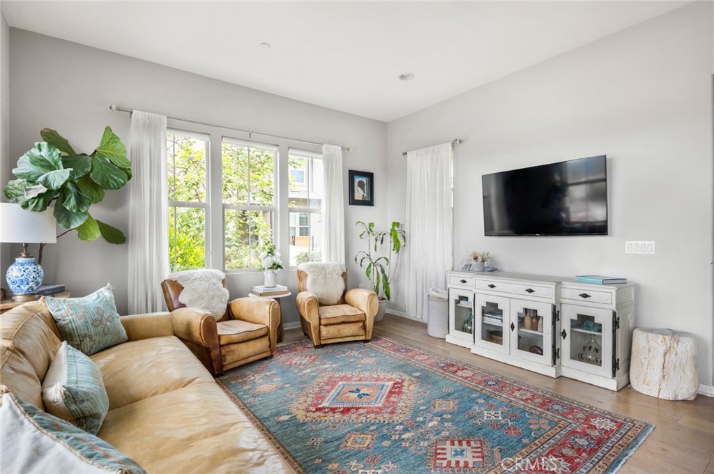 75 Promesa Avenue Rancho Mission Viejo, CA 92694 - Photo 12 of 47 a living room with furniture and a flat screen tv