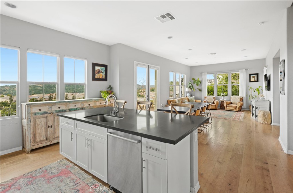 75 Promesa Avenue Rancho Mission Viejo, CA 92694 - Photo 18 of 47 a kitchen with sink stove and cabinets