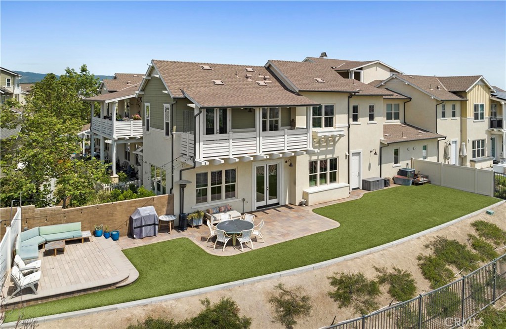 75 Promesa Avenue Rancho Mission Viejo, CA 92694 - Photo 2 of 47 a front view of a house with garden