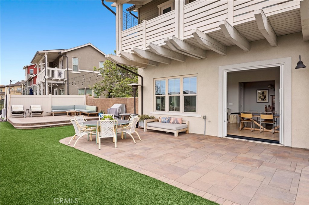 75 Promesa Avenue Rancho Mission Viejo, CA 92694 - Photo 24 of 47 a view of a house with backyard and sitting area