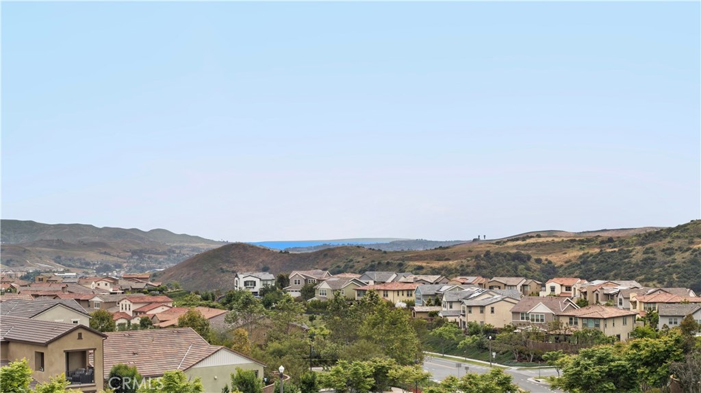 75 Promesa Avenue Rancho Mission Viejo, CA 92694 - Photo 30 of 47 an aerial view of residential houses and city view