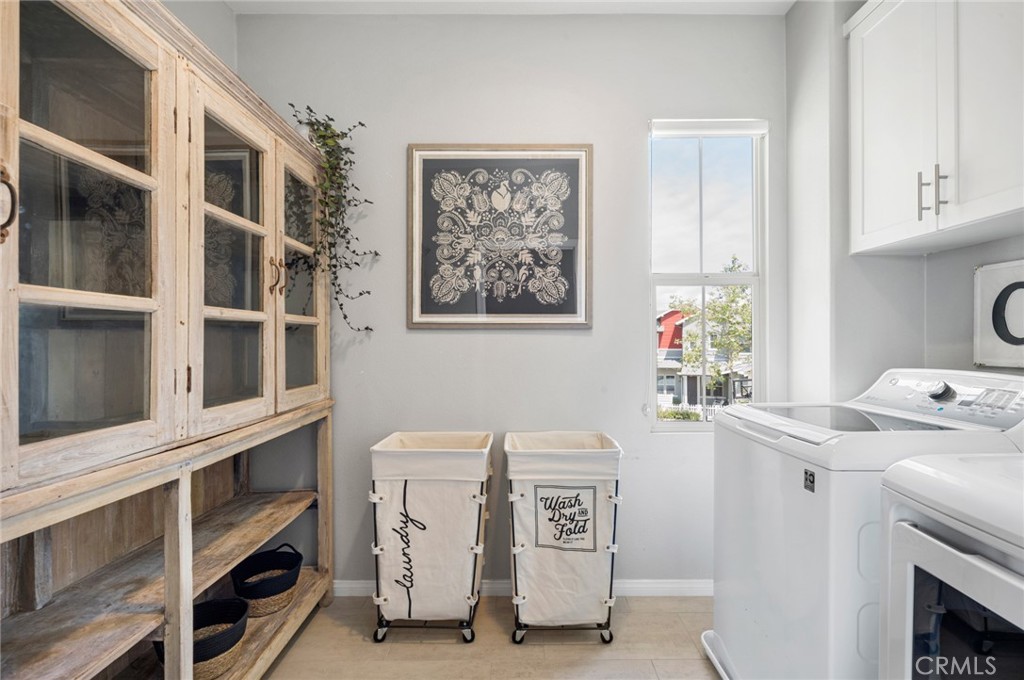 75 Promesa Avenue Rancho Mission Viejo, CA 92694 - Photo 40 of 47 a storage room with washer and dryer