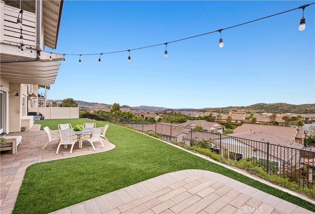 75 Promesa Avenue Rancho Mission Viejo, CA 92694 - Photo 4 of 47 a view of a terrace with a garden