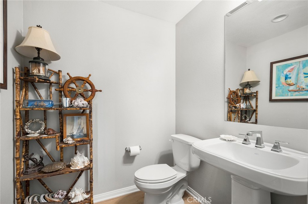 75 Promesa Avenue Rancho Mission Viejo, CA 92694 - Photo 41 of 47 a bathroom with a toilet and a sink