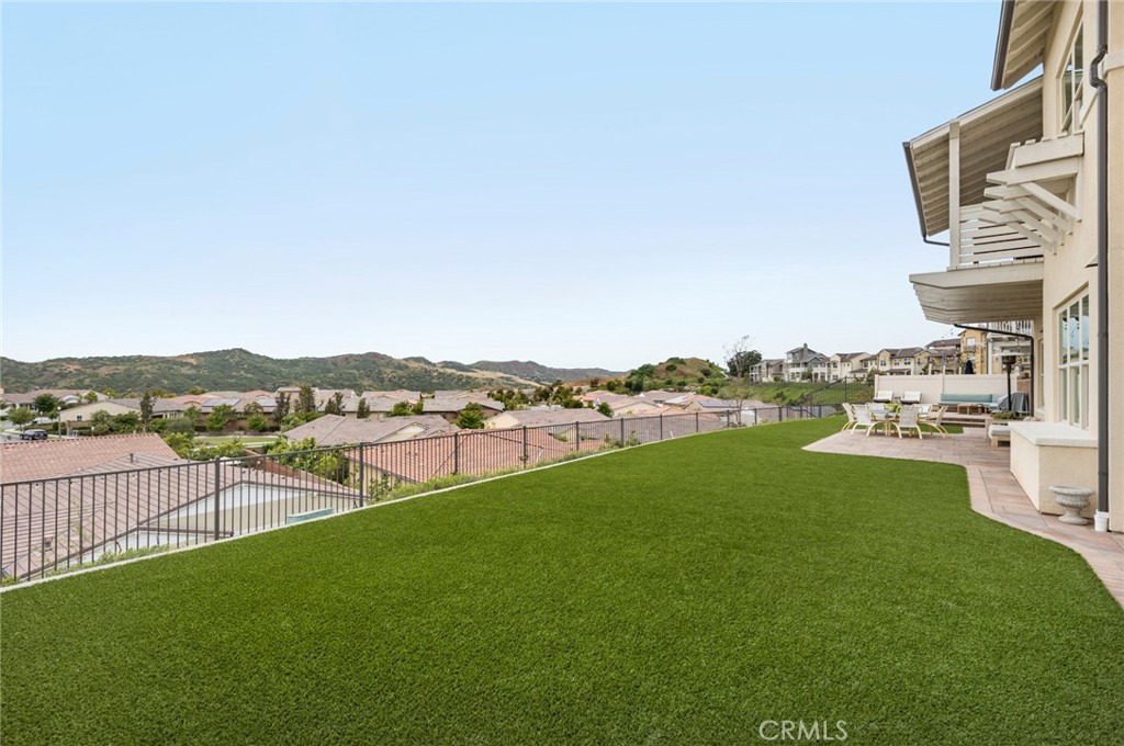 75 Promesa Avenue Rancho Mission Viejo, CA 92694 - Photo 5 of 47 a view of a lake with couches and city view
