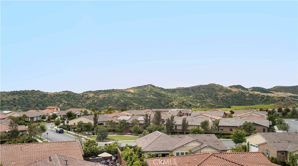 75 Promesa Avenue Rancho Mission Viejo, CA 92694 - Photo 6 of 47 an aerial view of residential house with outdoor space and trees