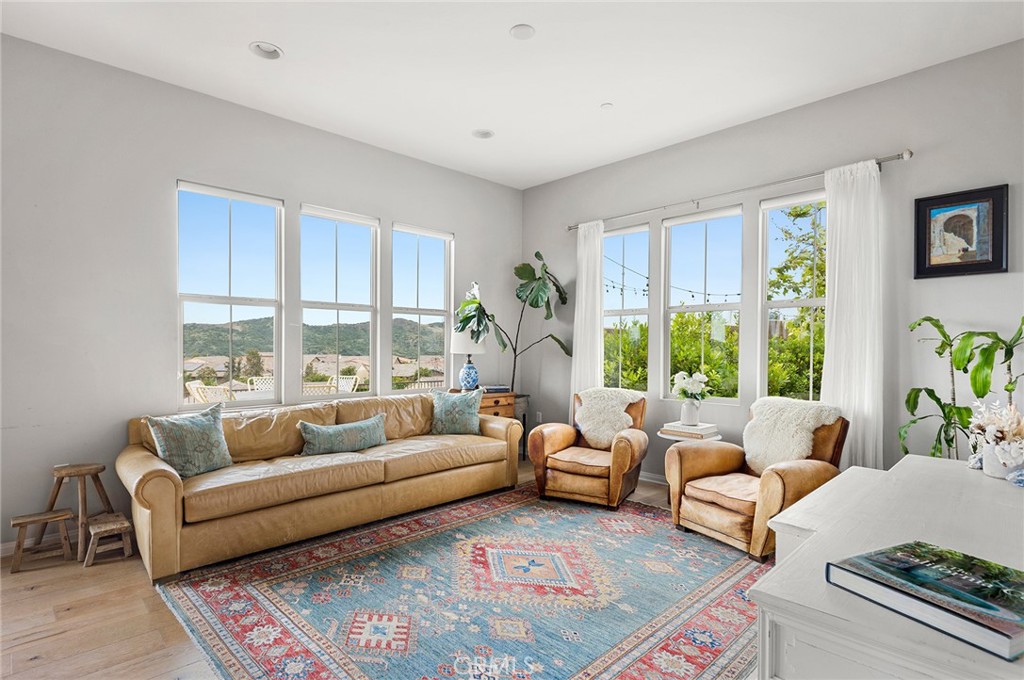 75 Promesa Avenue Rancho Mission Viejo, CA 92694 - Photo 10 of 47 a living room with furniture and a large window