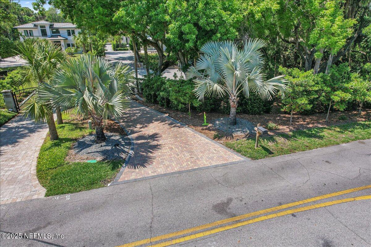 2446 Seminole Road Atlantic Beach, FL 32233 - Photo 39 of 45 a view of a park with plants and a bench