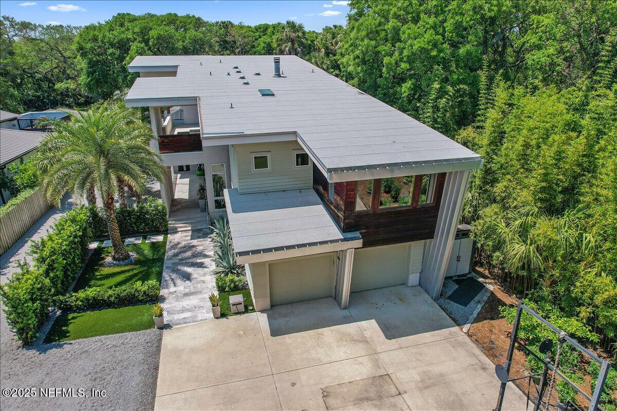 2446 Seminole Road Atlantic Beach, FL 32233 - Photo 41 of 45 an aerial view of a house with a yard