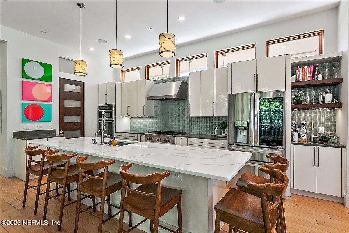 2446 Seminole Road Atlantic Beach, FL 32233 - Photo 8 of 45 a dinning area with furniture and kitchen view