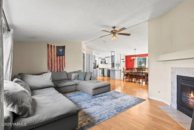 a dining room with furniture window and wooden floor