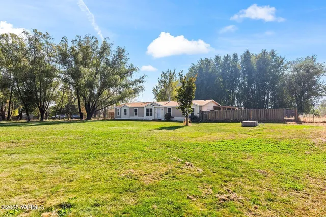 a view of a swimming pool with an outdoor space and seating area