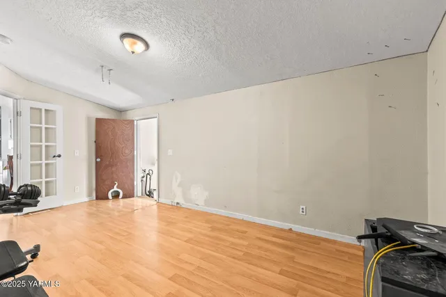 a view of a livingroom with furniture and windows