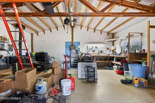 an aerial view of residential houses and outdoor space