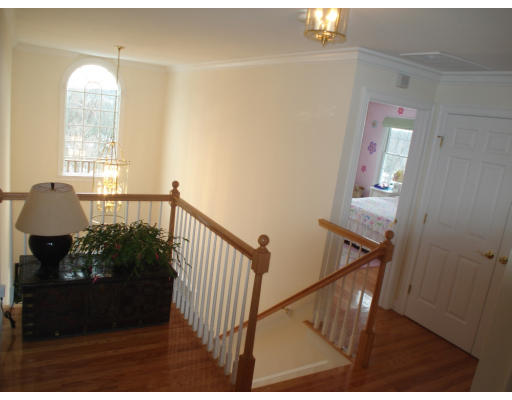 23 Bird Hill Road Lexington, MA 02421 - Photo 11 of 30 a view of entryway and hall with wooden floor