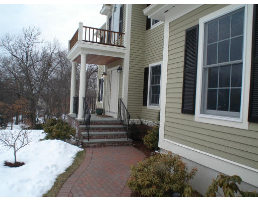 23 Bird Hill Road Lexington, MA 02421 - Photo 2 of 30 a front view of a house with a yard