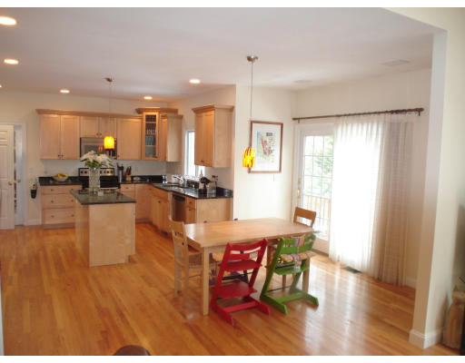 23 Bird Hill Road Lexington, MA 02421 - Photo 6 of 30 a living room with furniture wooden floor and a view of kitchen