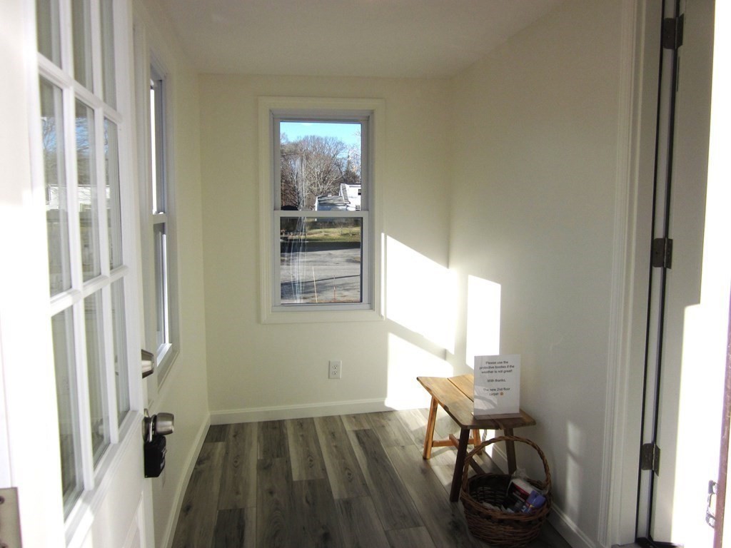 6 James Street Webster, MA 01570 - Photo 5 of 37 a view of a room that has a bed and a chair in it