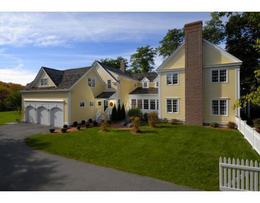 532 Lexington Road Concord, MA 01742 - Photo 2 of 20 a front view of a house with a yard