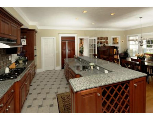 532 Lexington Road Concord, MA 01742 - Photo 8 of 20 a kitchen with a sink a counter space and cabinets