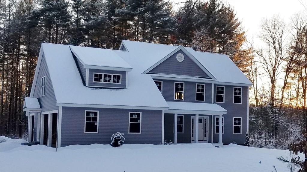 146 Worcester Road Hollis, NH 03049 - Photo 1 of 2 a view of a house with a yard and large tree