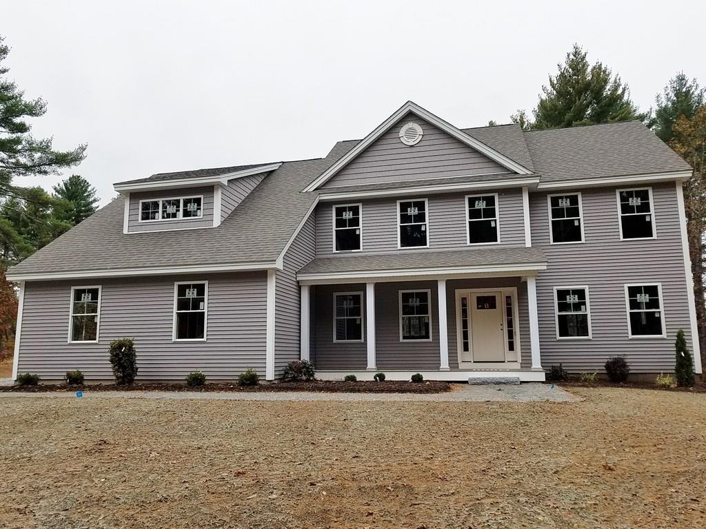 146 Worcester Road Hollis, NH 03049 - Photo 2 of 2 a front view of a house with a yard