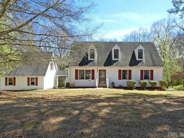 706 Young Road Angier, NC 27501 - Photo 1 of 25 a front view of residential houses with yard