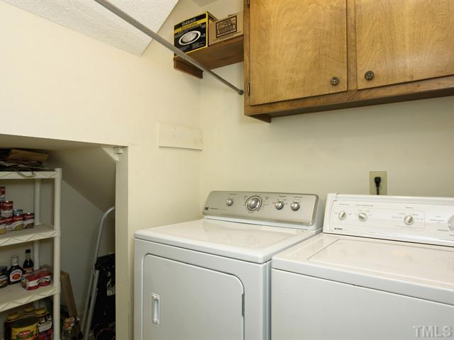 706 Young Road Angier, NC 27501 - Photo 16 of 25 a utility room with dryer and washer