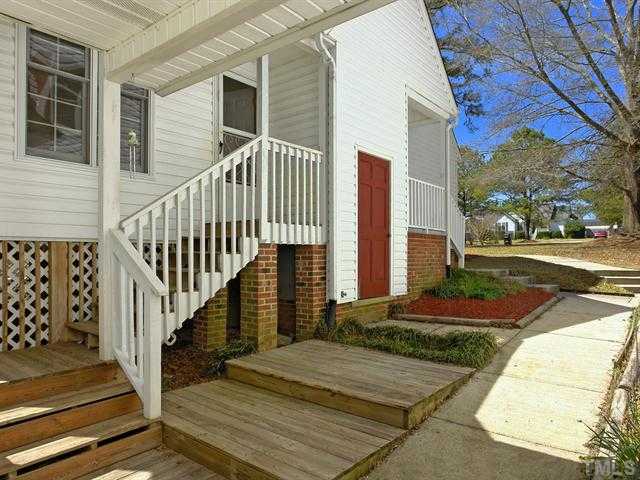 706 Young Road Angier, NC 27501 - Photo 22 of 25 a view of a brick house with many windows