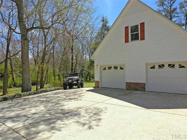 706 Young Road Angier, NC 27501 - Photo 23 of 25 a view of a house with a patio
