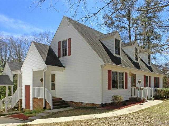 706 Young Road Angier, NC 27501 - Photo 24 of 25 a front view of a house with a yard