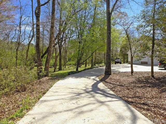 706 Young Road Angier, NC 27501 - Photo 25 of 25 a view of a backyard with trees